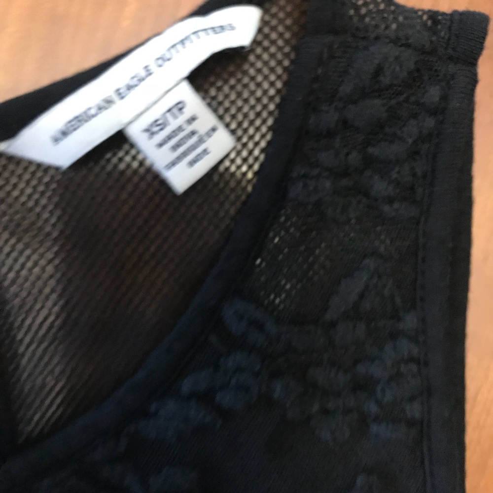 Ruffle black tank